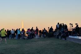 Hundreds of amateur and professional photographers were at the Netherlands Carillon to capture a shot of the supermoon on Sunday, Nov. 13, 2016. (WTOP/Hillary Howard)