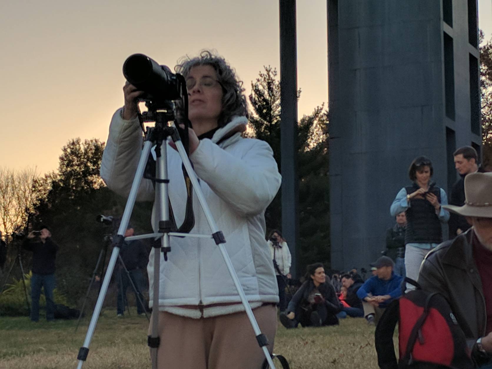 A photographer sets up her camera ahead of the supermoon’s arrival in the evening sky Sunday, Nov. 13, 2016. (WTOP/Hillary Howard)