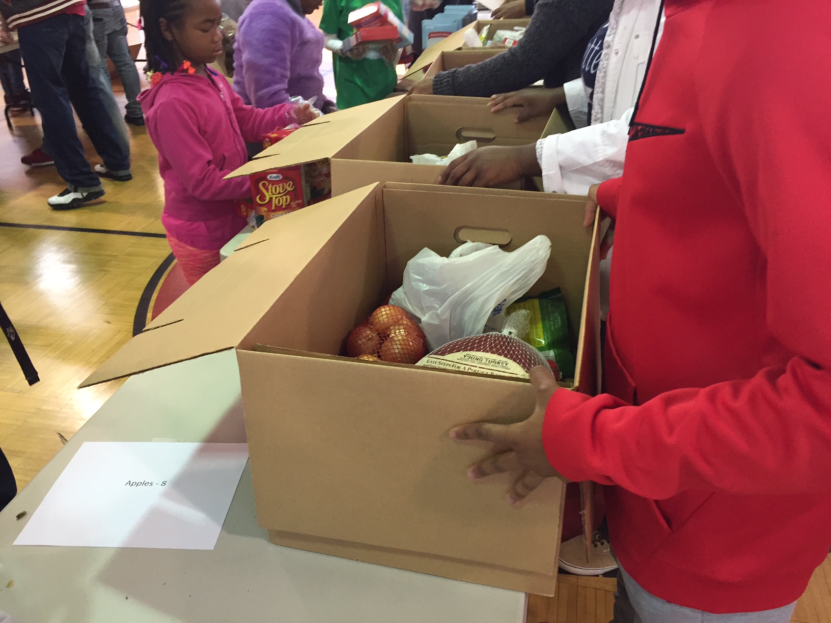 The food used in Project Giveback's boxes for those in need comes from the SHARE food network and features turkeys, whole chickens, sweet potatoes and other staples of a traditional Thanksgiving meal.  (WTOP/Dennis Foley)