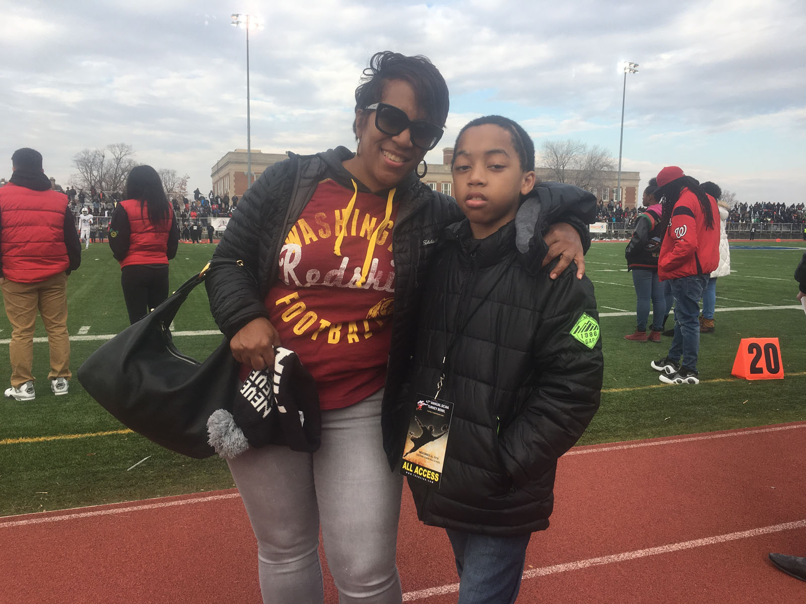 Boy who survived bullet to head cheers on at DC Turkey Bowl WTOP News