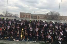 H.D. Woodson High School celebrates after winning the Turkey Bowl Thursday, Nov. 24, 2016. (WTOP/Mike Murillo)
