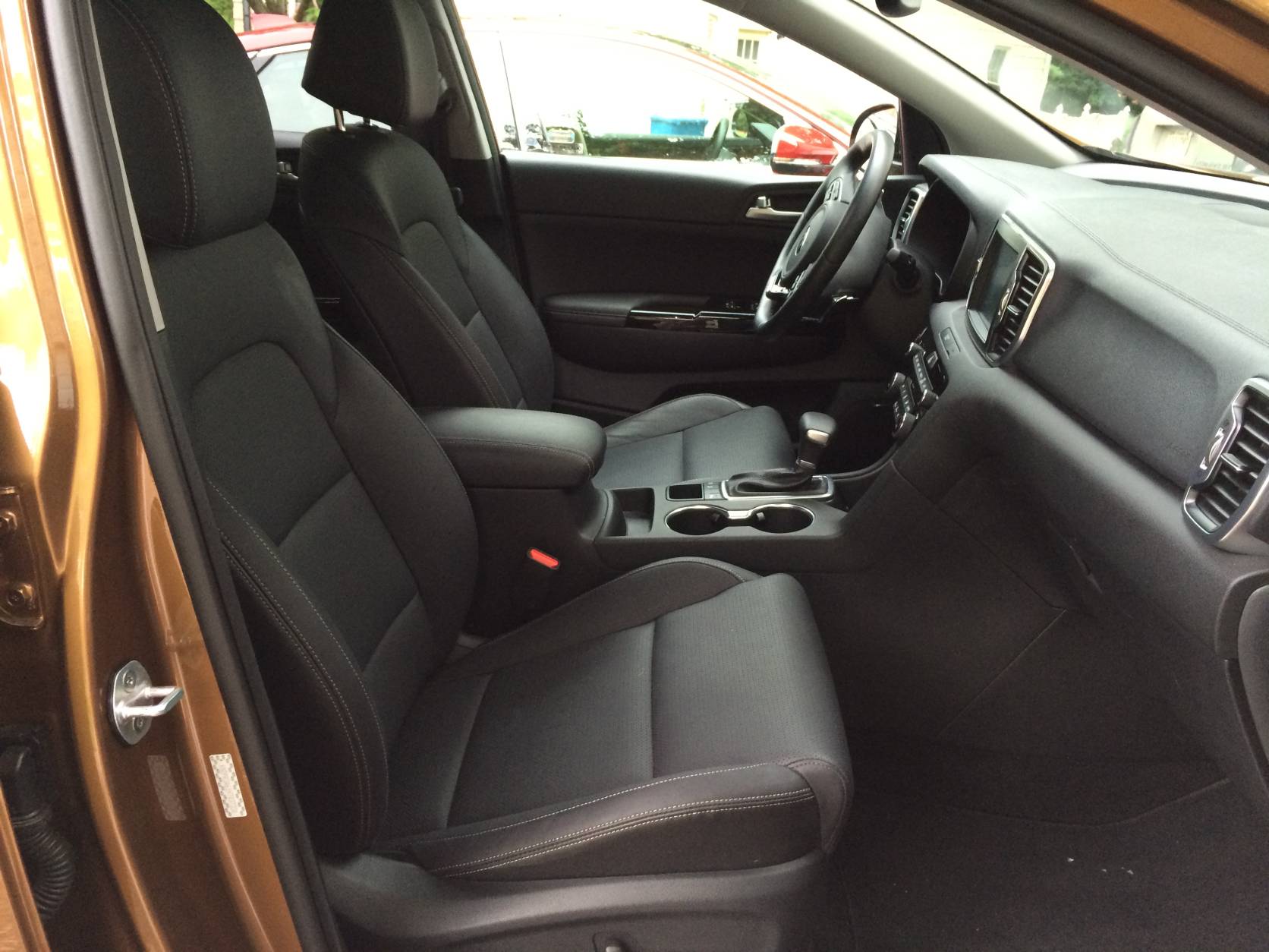 The heated and ventilated front seats have nice-looking leather in this class. (WTOP/Mike Parris)