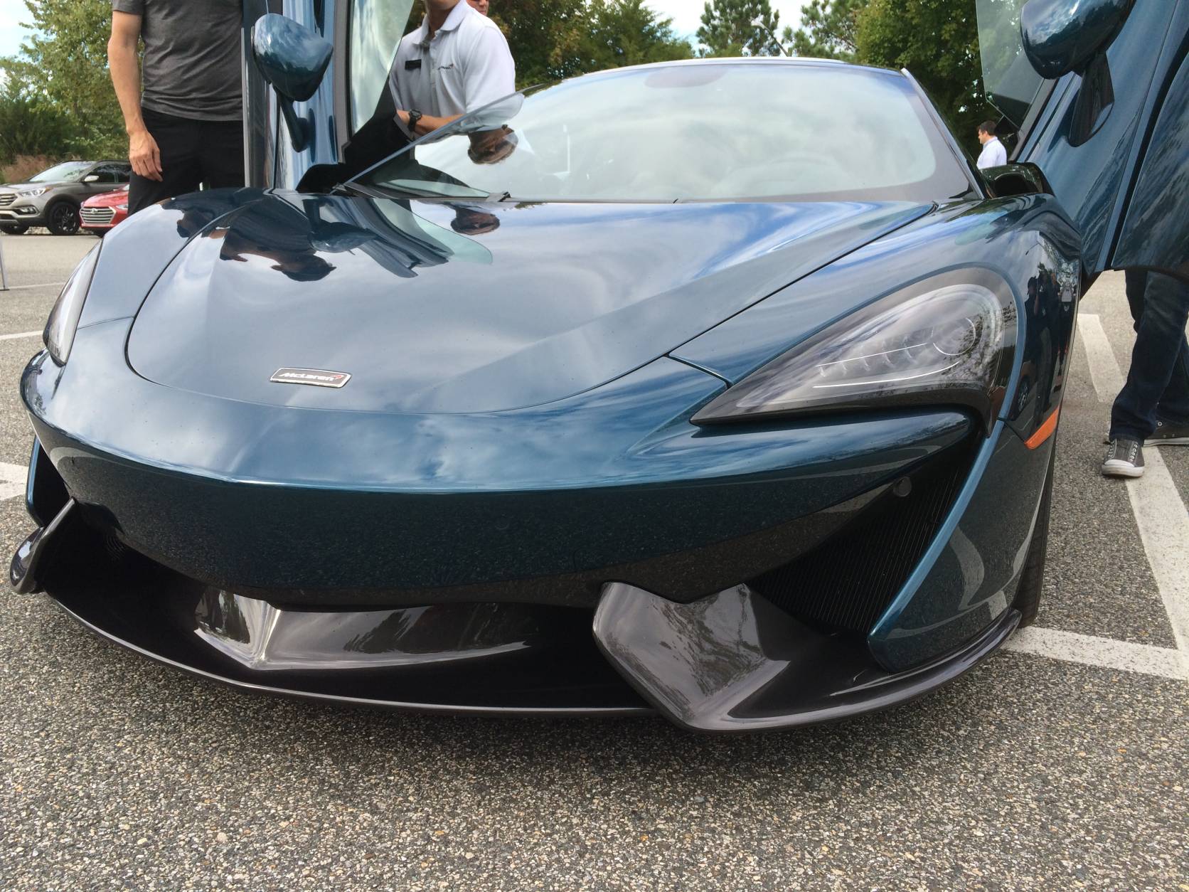 The McLaren 570S fills the exotic car mantra by having a door that swings up instead of opening normally, and there is a bit of a step over the wider sill to slide in this low riding car. (WTOP/Mike Parris)