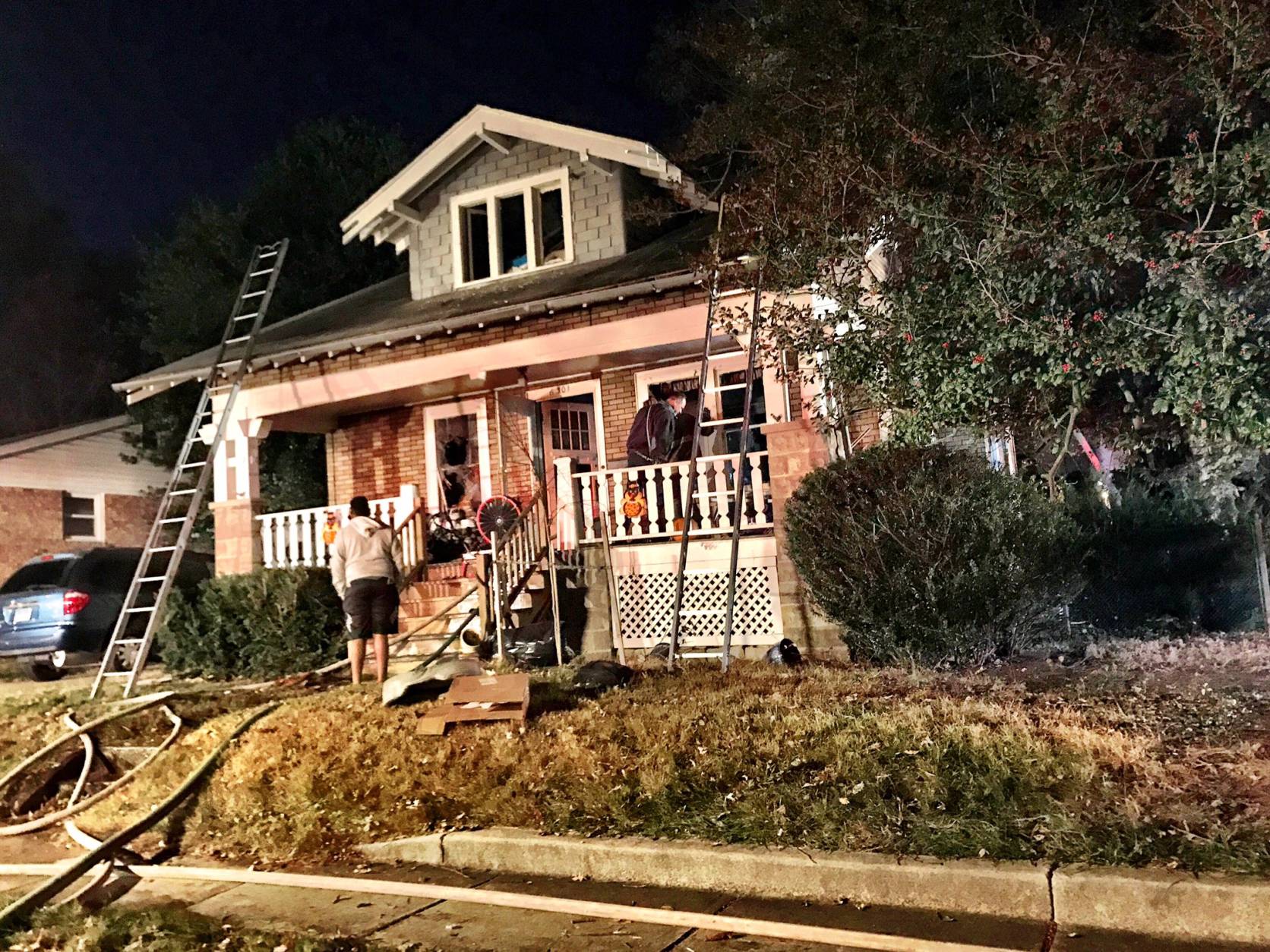 A woman is in critical condition and her daughter is in the hospital after a house fire on Sheridan Street early Wednesday morning. (WTOP/Neal Augenstein)