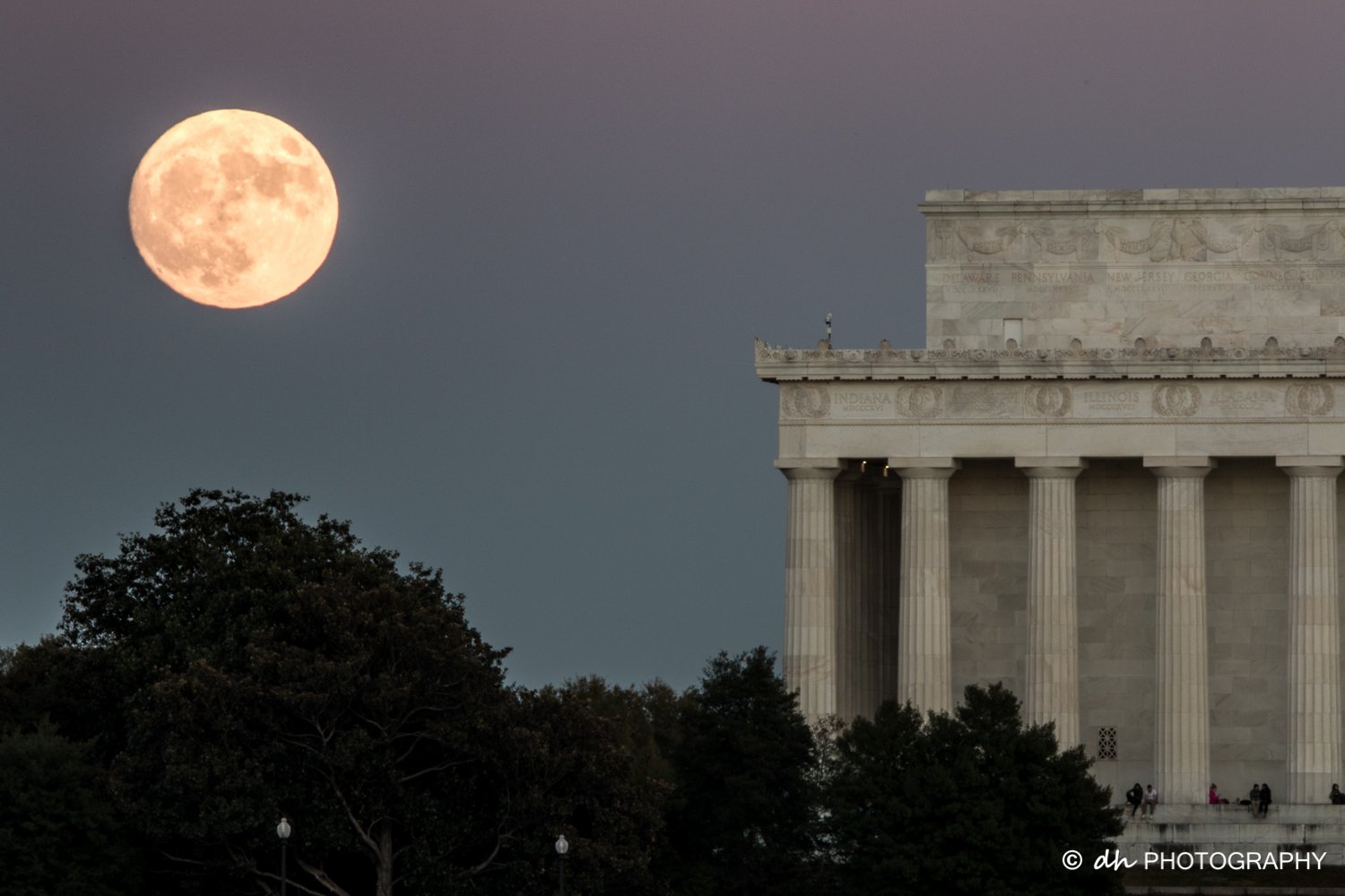The supermoon on the rise. (Courtesy DH Photography)