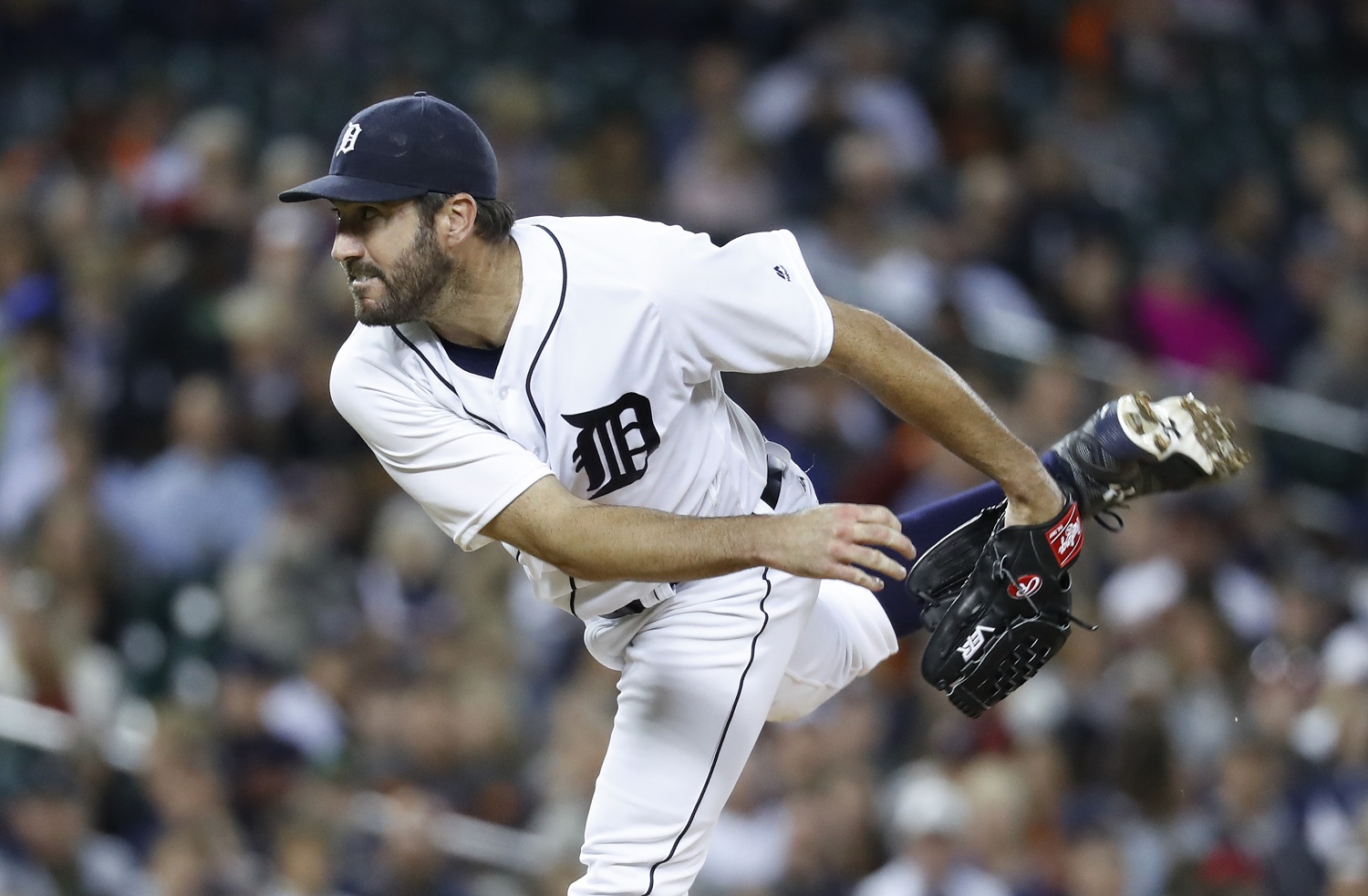 Detroit Tigers pitcher Justin Verlander follows through on a pitch to a Cleveland Indians batter during the sixth inning of a baseball game in Detroit, Tuesday, Sept. 27, 2016. (AP Photo/Paul Sancya)