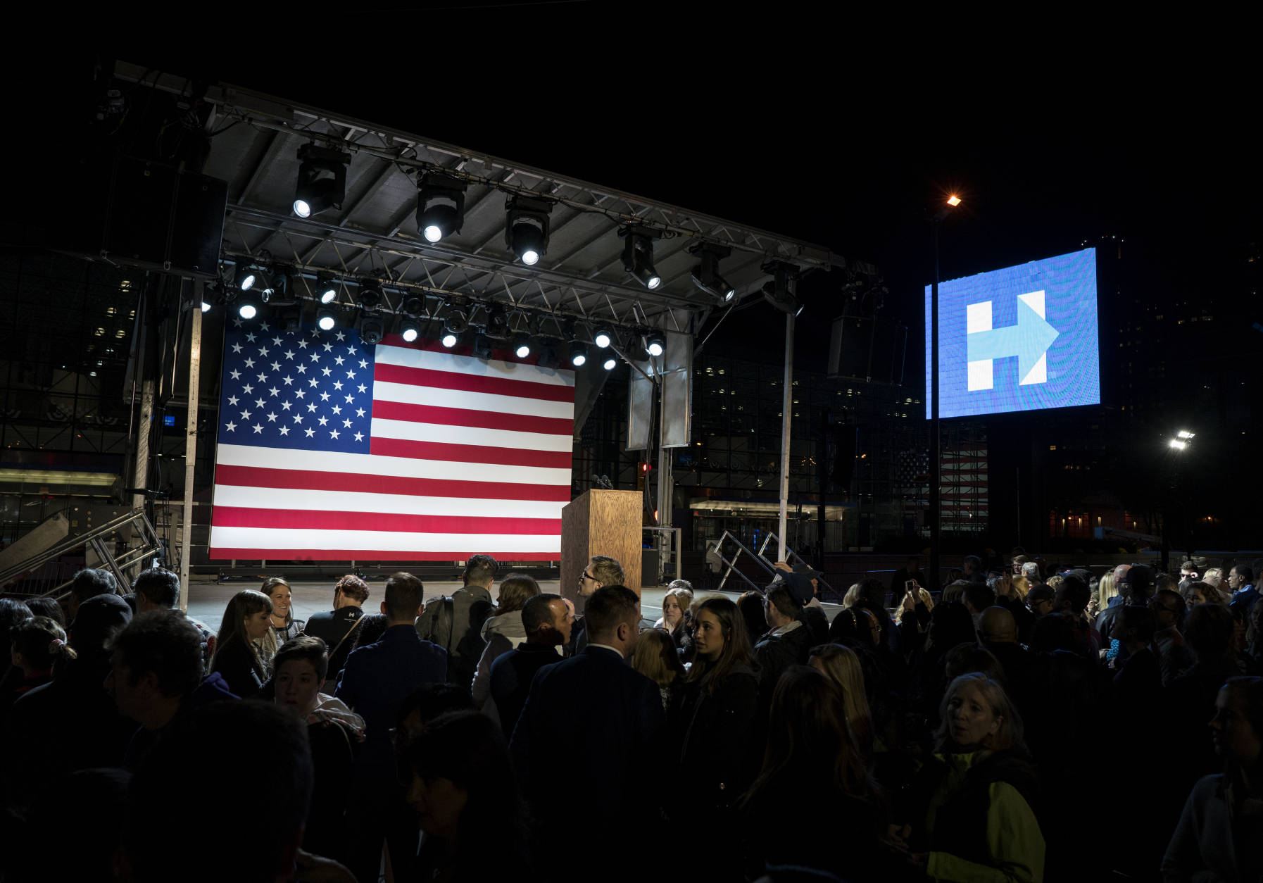 People begin to arrive outside the Jacob Javits Center for Democratic presidential candidate Hillary Clinton's rally in New York, Tuesday, Nov. 8, 2016. (AP Photo/Craig Ruttle)
