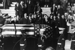 Jacqueline Kennedy, Edward Kennedy and Robert Kennedy stand as the coffin of President John Fitzgerald Kennedy passes them. Original Publication: People Disc - HF0367 (Photo by Keystone/Getty Images)
