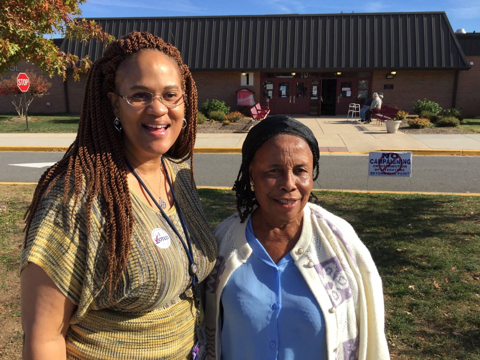 "I'm happy tonight will be the end to all this," said Kathleen Martin, of Northern Virginia precinct 408. Next to her, Debrah Allotey said, "God will choose the best person." (WTOP/Kristi King)