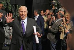 Sen. John McCain, R-Ariz. waves to supporters as he arrives for his victory party prior to officially announcing his victory over Democratic, Rep. Ann Kirkpatrick, D-Ariz., Tuesday, Nov. 8, 2016, in Phoenix. (AP Photo/Ross D. Franklin)