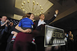 Missouri Republican Governor-elect Eric Greitens delivers a victory speech along side his wife Sheena and son Joshua Tuesday, Nov. 8, 2016, in Chesterfield, Mo. (AP Photo/Jeff Curry)