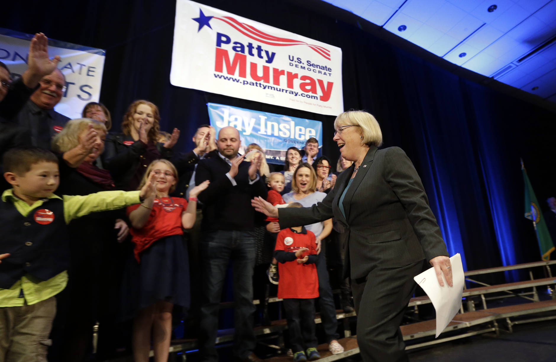 Sen. Patty Murray, D-Wash., right, greets family members as she takes the stage at an election night party for Democrats Tuesday, Nov. 8, 2016, in Seattle. Murray was elected to her fifth term as she defeated Republican Chris Vance. (AP Photo/Elaine Thompson)