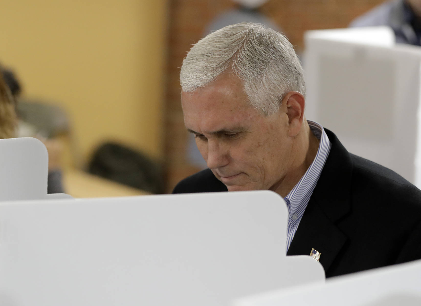 Republican vice presidential candidate, Indiana Gov. Mike Pence, cast his is ballot, Tuesday, Nov. 8, 2016, in Indianapolis. (AP Photo/Darron Cummings)