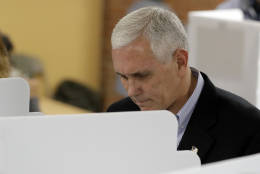 Republican vice presidential candidate, Indiana Gov. Mike Pence, cast his is ballot, Tuesday, Nov. 8, 2016, in Indianapolis. (AP Photo/Darron Cummings)