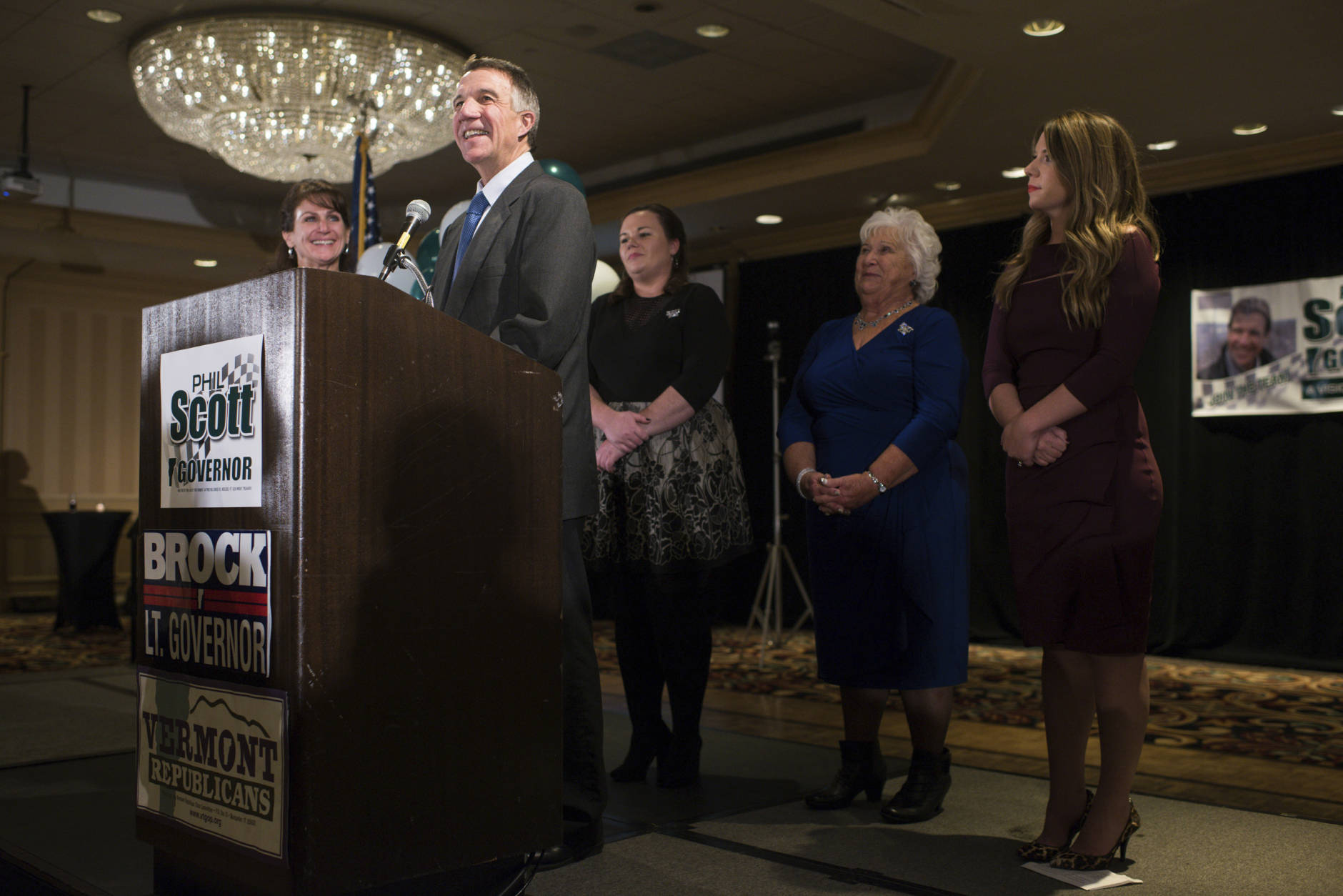 Vermont Republican Phil Scott, who won the Vermont governor's race, speaks to a room full of supporters along with his family on stage Tuesday, Nov. 8, 2016, in South Burlington, Vt. (AP Photo/Andy Duback)