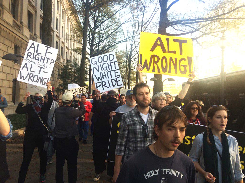 Demonstrators march on Pennsylvania Avenue in protest of the "Alt Right" group meeting inside the Ronald Reagan Building and International Trade Center on Saturday, Nov. 19, 2016. (WTOP/Dick Uliano)
