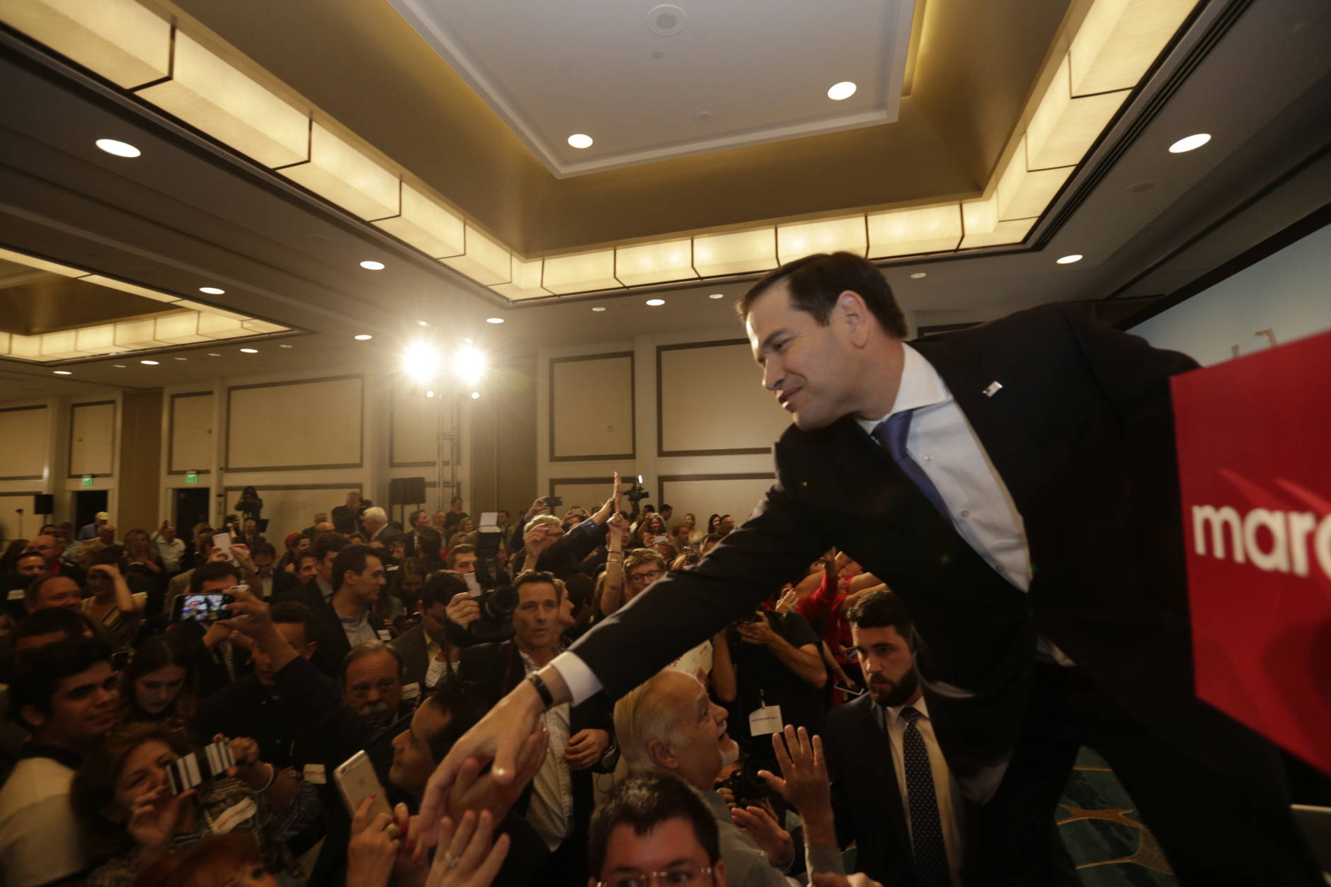 Florida Republican Sen. Marco Rubio greets supporters after winning a second term in office, Tuesday, Nov. 8, 2016 in Miami. Rubio defeated U.S. Rep. Patrick Murphy, a two-term congressman. (AP Photo/Wilfredo Lee)