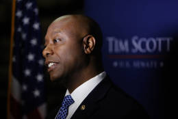 U.S. Sen. Tim Scott, R-S.C., holds a news conference after winning his Senate race against Democratic challenger Thomas A. Dixon at the North Charleston Performing Arts Center in North Charleston, S.C. Tuesday, Nov. 8, 2016. (AP Photo/Mic Smith)