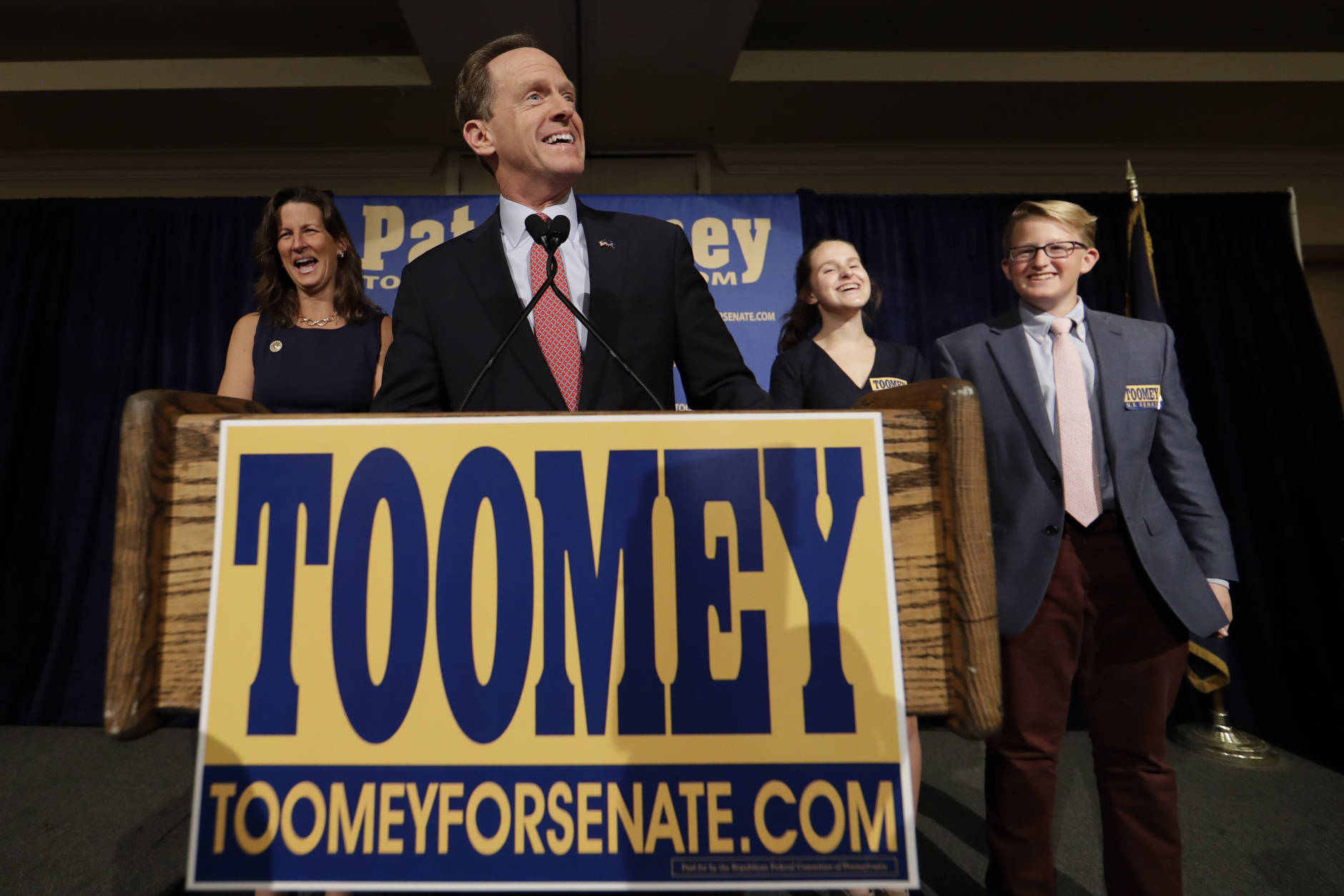Sen. Pat Toomey, R-Pa., smiles as he speaks to supporters during an election night event, early Wednesday morning, Nov. 9, 2016, in Breinigsville, Pa. (AP Photo/Matt Slocum)
