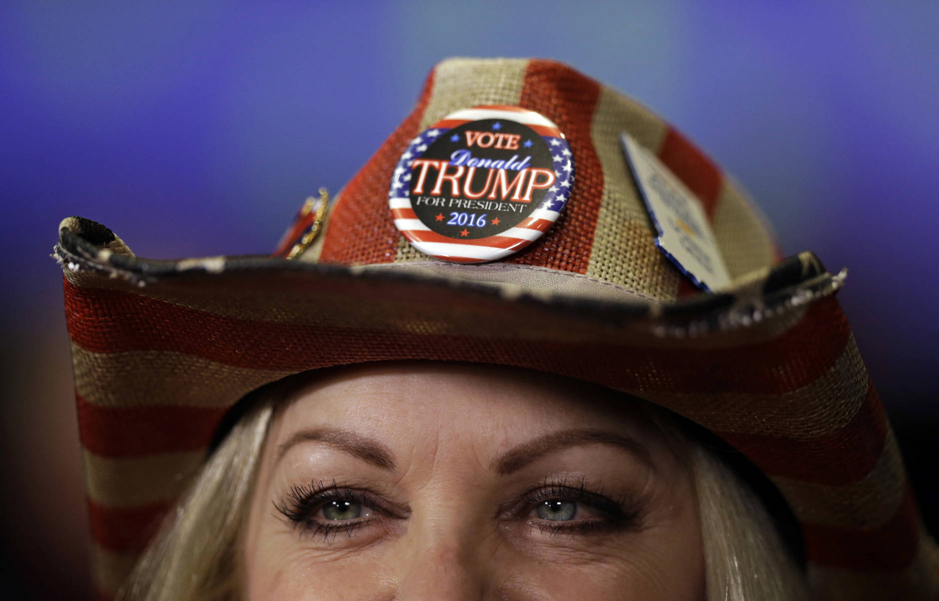 Donna Deer, a supporter of Republican presidential candidate Donald Trump waits to be interviewed during an election night rally in Indianapolis, Tuesday, Nov. 8, 2016. (AP Photo/Michael Conroy)
