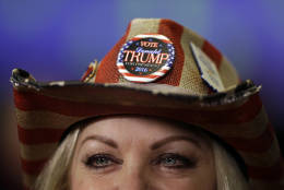 Donna Deer, a supporter of Republican presidential candidate Donald Trump waits to be interviewed during an election night rally in Indianapolis, Tuesday, Nov. 8, 2016. (AP Photo/Michael Conroy)