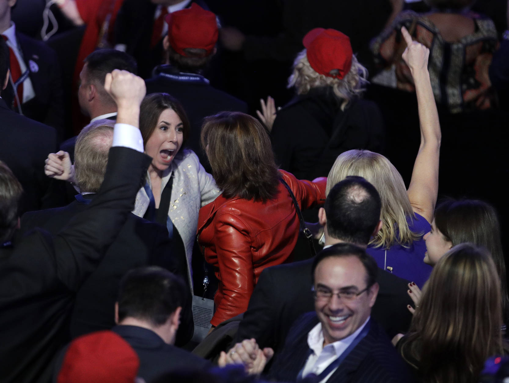 Supporters of Republican presidential candidate Donald Trump react as they watch the election results during Trump's election night rally, Tuesday, Nov. 8, 2016, in New York. (AP Photo/John Locher)