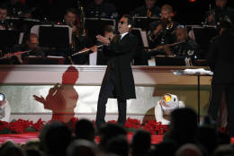 Singer Marc Anthony performs during the lighting ceremony for the 2016 National Christmas Tree on the Ellipse near the White House, Thursday, Dec. 1, 2016 in Washington. (AP Photo/Alex Brandon)