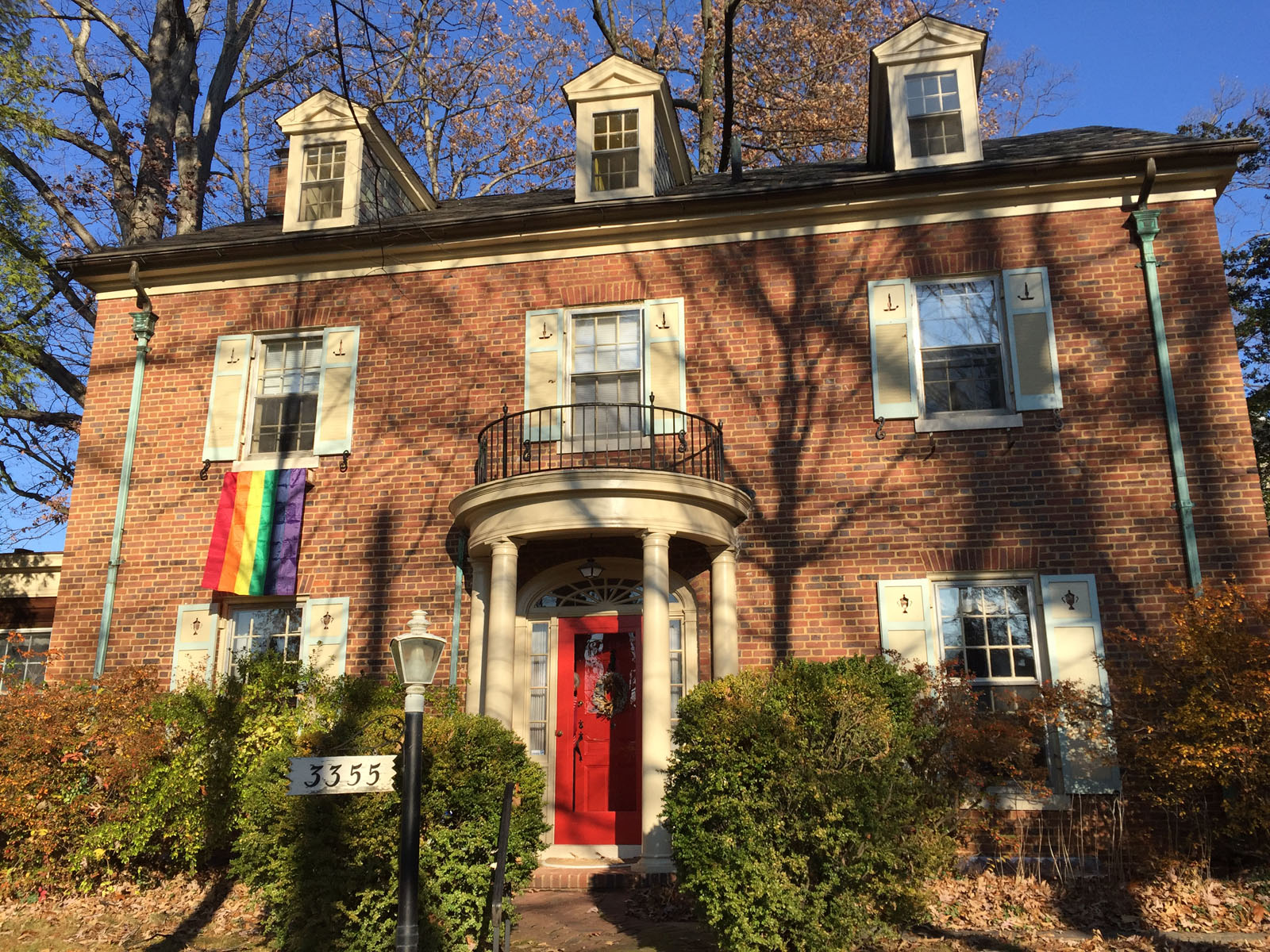 As of Friday, there were at least nine rainbow flags flying at houses near Pence's temporary home. (WTOP/Michelle Basch)