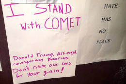 Messages of support outside Comet Ping Pong restaurant Monday night after the weekend's gun scare. (WTOP/Judy Taub)