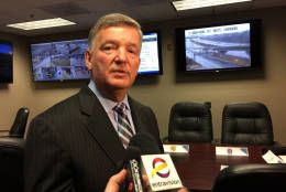 Kent Digby, senior vice president for operations at National Harbo, speaking to reporters Tuesday about preparations for the opening of the MGM Grand casino and resort. A helicopter pad on the edge of the MGM property will be for police and medical emergencies -- not for the "big rollers," he said. (WTOP/Kristi King)