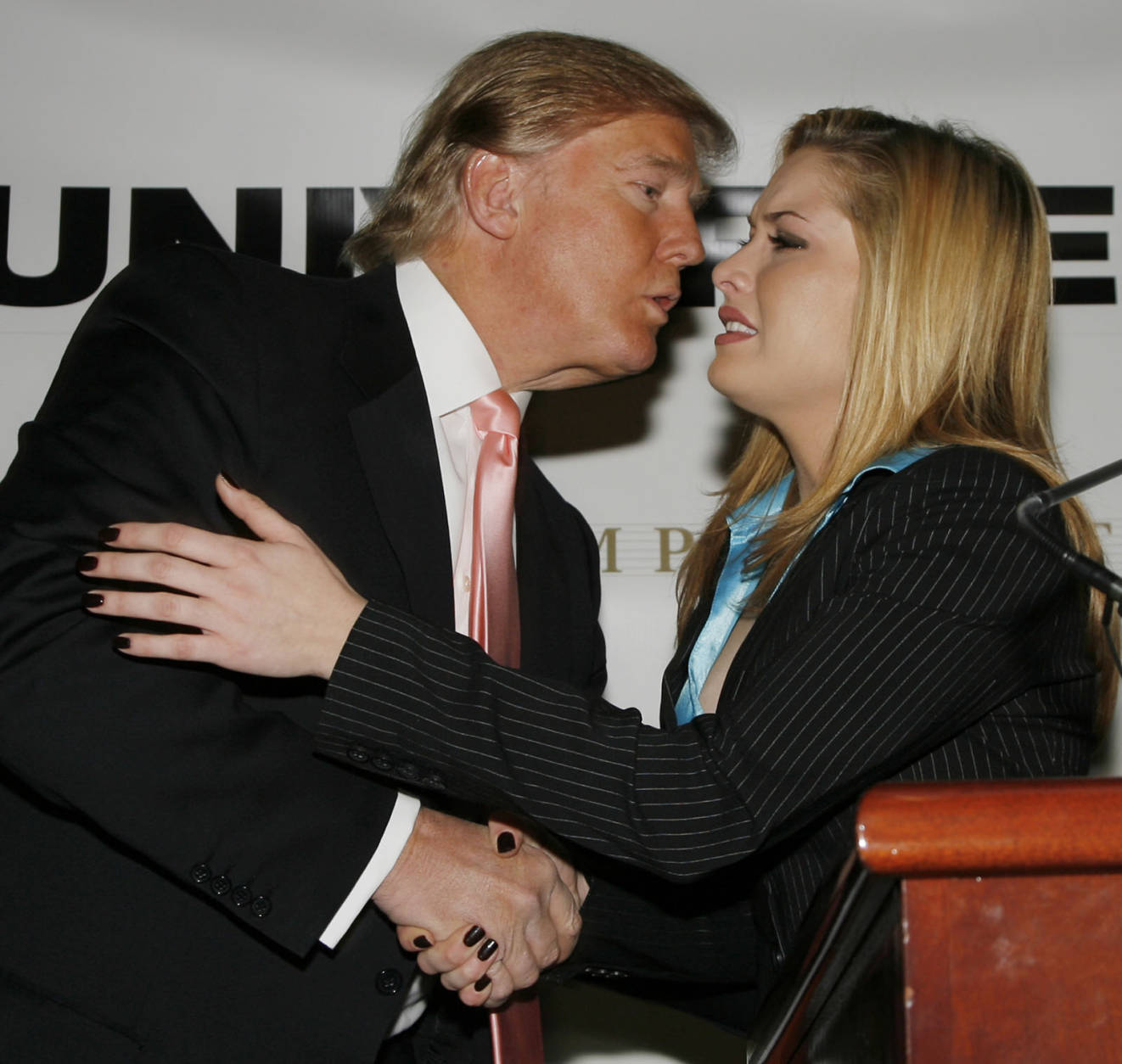 Miss USA 2006 Tara Conner, is kissed by Donald Trump after a news conference on Tuesday Dec. 19, 2006 in New York City. Conner, who had come under criticism amid rumors she had been frequenting bars while underage, will be allowed to keep her title, Donald Trump announced at the news conference.  (AP Photo/Rick Maiman)