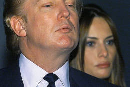 New York billionaire real estate tycoon Donald Trump and his 26-year-old girlfriend model Melania Knauss listen to recorded Nazi propaganda as they tour the Museum of Tolerance in Los Angeles on Tuesday, Dec. 7, 1999. Trump, who is contemplating a presidential run is in the Southern California area to address Reform Party leaders and to give a motivational speech in Orange County. (AP Photo/Damian Dovarganes)
