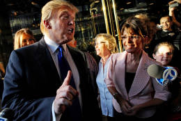 Donald Trump makes a point as he walks with former governor of Alaska Sarah Palin in New York City as they make their way to a scheduled meeting Tuesday, May 31, 2010. (AP Photo/Craig Ruttle)