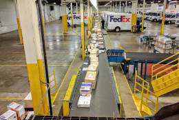 Inside the FedEx Express warehouse in Alexandria, Virginia, as the shipping giant prepares for a crush of holiday packages. (WTOP/Ginger Whitaker)