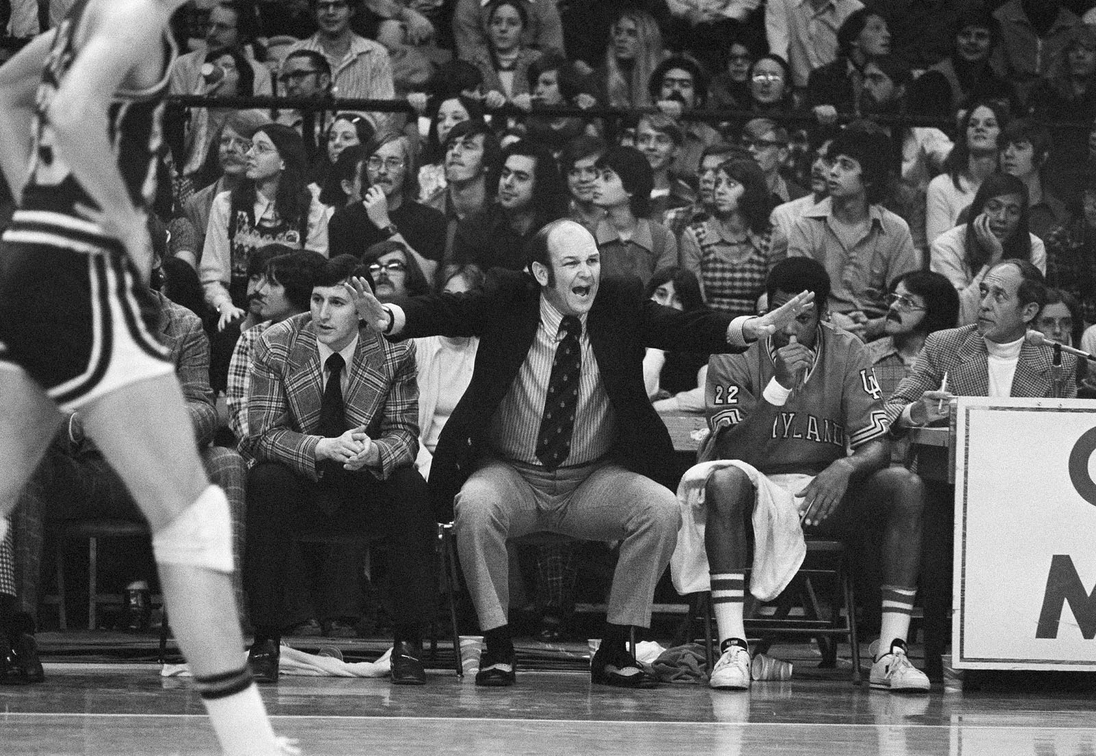 University of Maryland head basketball coach Charles "Lefty" Driesell shouts encouragement to his team as they clash with Duke University at College Park, Md., Feb. 2, 1974. (AP Photo/William Smith)