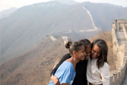 First Lady Michelle Obama hugs daughters Sasha, left, and Malia as they visit the Great Wall of China in Mutianyu, China, March 23, 2014. (Official White House Photo by Amanda Lucidon)

This official White House photograph is being made available only for publication by news organizations and/or for personal use printing by the subject(s) of the photograph. The photograph may not be manipulated in any way and may not be used in commercial or political materials, advertisements, emails, products, promotions that in any way suggests approval or endorsement of the President, the First Family, or the White House.