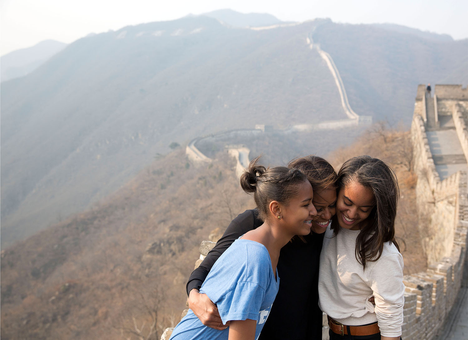 First Lady Michelle Obama hugs daughters Sasha, left, and Malia as they visit the Great Wall of China in Mutianyu, China, March 23, 2014. (Official White House Photo by Amanda Lucidon)

This official White House photograph is being made available only for publication by news organizations and/or for personal use printing by the subject(s) of the photograph. The photograph may not be manipulated in any way and may not be used in commercial or political materials, advertisements, emails, products, promotions that in any way suggests approval or endorsement of the President, the First Family, or the White House.