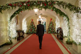 Dec. 12, 2014
"The President walks through the Ground Floor Corridor of the White House as he heads back to the Oval Office following a holiday reception." 
(Official White House Photo by Pete Souza)

This official White House photograph is being made available only for publication by news organizations and/or for personal use printing by the subject(s) of the photograph. The photograph may not be manipulated in any way and may not be used in commercial or political materials, advertisements, emails, products, promotions that in any way suggests approval or endorsement of the President, the First Family, or the White House.