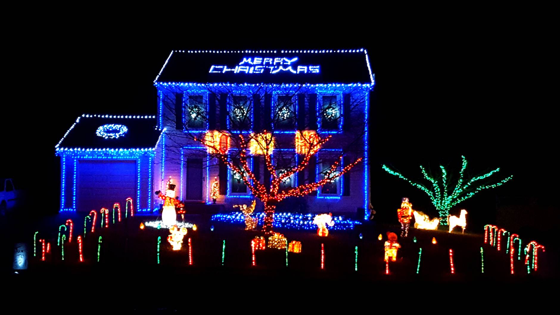 This twinkling light display  is animated to music, with a 15-minute show that plays continuously from 5:30 to 10 p.m. Lights remain on until midnight. See this home at 14549B Lock Drive in Centreville, Virginia. (Courtesy Lisa Abraham)
