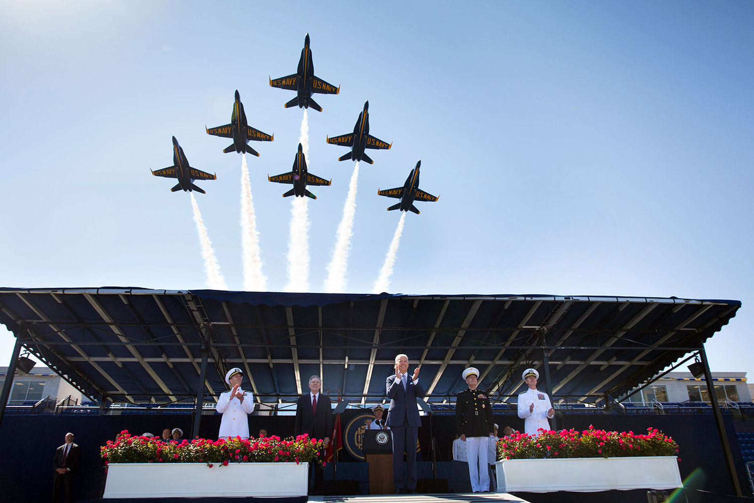 May 22, 2015
“Great timing by David Lienemann to capture the Blue Angels flyover as the Vice President and other officials applauded during the commencement ceremonies at the Naval Academy in Annapolis, Md.” (Official White House Photo by David Lienemann)
This official White House photograph is being made available only for publication by news organizations and/or for personal use printing by the subject(s) of the photograph. The photograph may not be manipulated in any way and may not be used in commercial or political materials, advertisements, emails, products, promotions that in any way suggests approval or endorsement of the President, the First Family, or the White House.