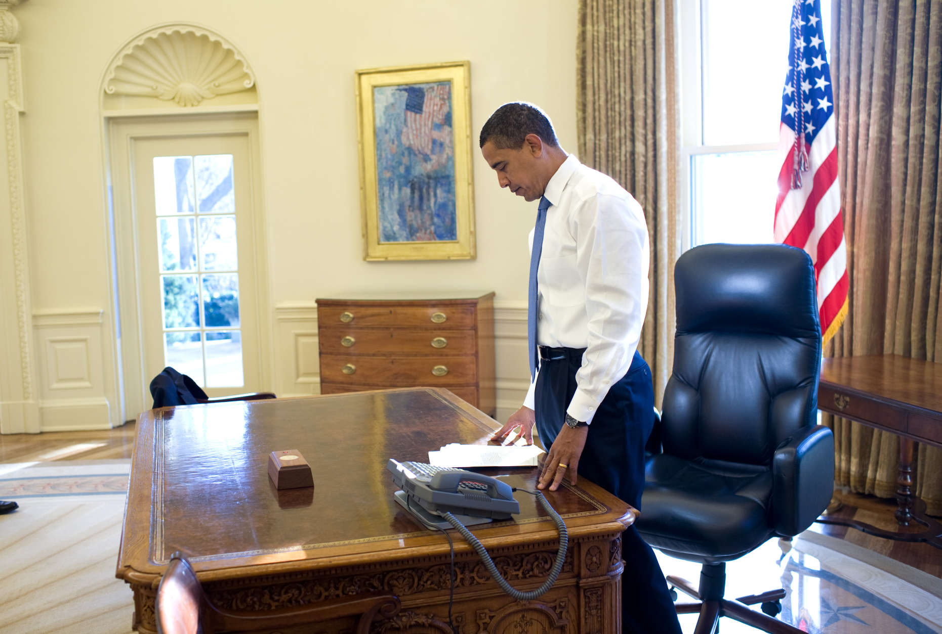 Jan. 21, 2009
ÒThis was his first morning in the Oval Office as President of the United States. He was reading some briefing material before a meeting.Ó
(Official White House photo by Pete Souza)

This official White House photograph is being made available only for publication by news organizations and/or for personal use printing by the subject(s) of the photograph. The photograph may not be manipulated in any way and may not be used in commercial or political materials, advertisements, emails, products, promotions that in any way suggests approval or endorsement of the President, the First Family, or the White House.