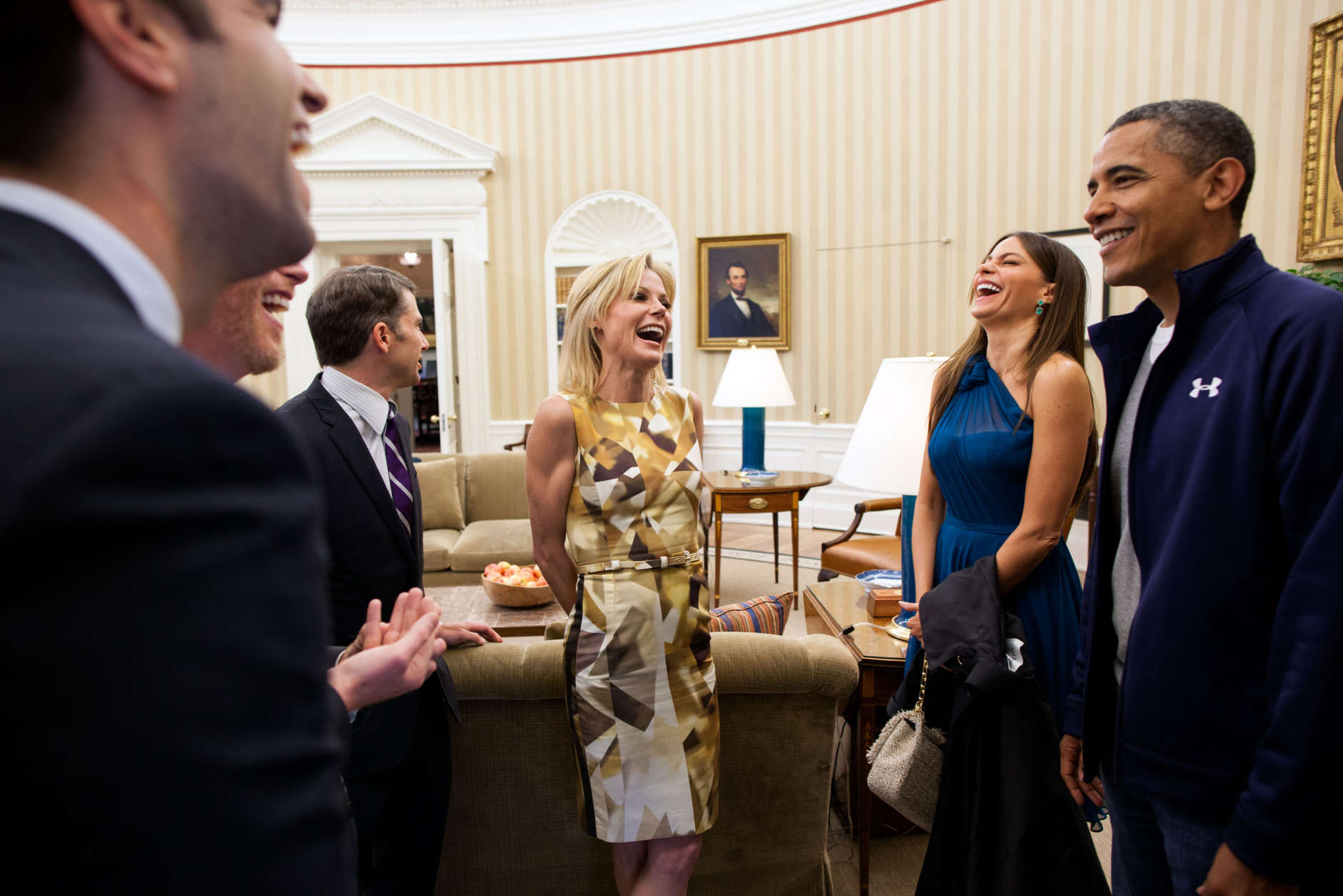 President Barack Obama greets cast members from ABC's sitcom "Modern Family", including Julie Bowen, center, and Sofia Vergara, right,  in the Oval Office, Saturday, April 28, 2012. The group was in town to attend the White House Correspondents' Dinner. 
(Official White House Photo by Pete Souza)

This official White House photograph is being made available only for publication by news organizations and/or for personal use printing by the subject(s) of the photograph. The photograph may not be manipulated in any way and may not be used in commercial or political materials, advertisements, emails, products, promotions that in any way suggests approval or endorsement of the President, the First Family, or the White House.