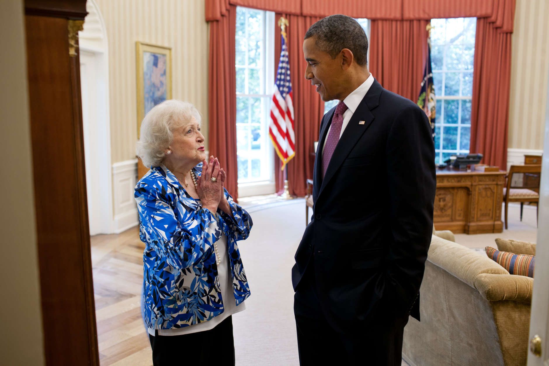 President Barack Obama talks with Betty White in the Oval Office, June 11, 2012. (Official White House Photo by Pete Souza)
    
This official White House photograph is being made available only for publication by news organizations and/or for personal use printing by the subject(s) of the photograph. The photograph may not be manipulated in any way and may not be used in commercial or political materials, advertisements, emails, products, promotions that in any way suggests approval or endorsement of the President, the First Family, or the White House.Ê