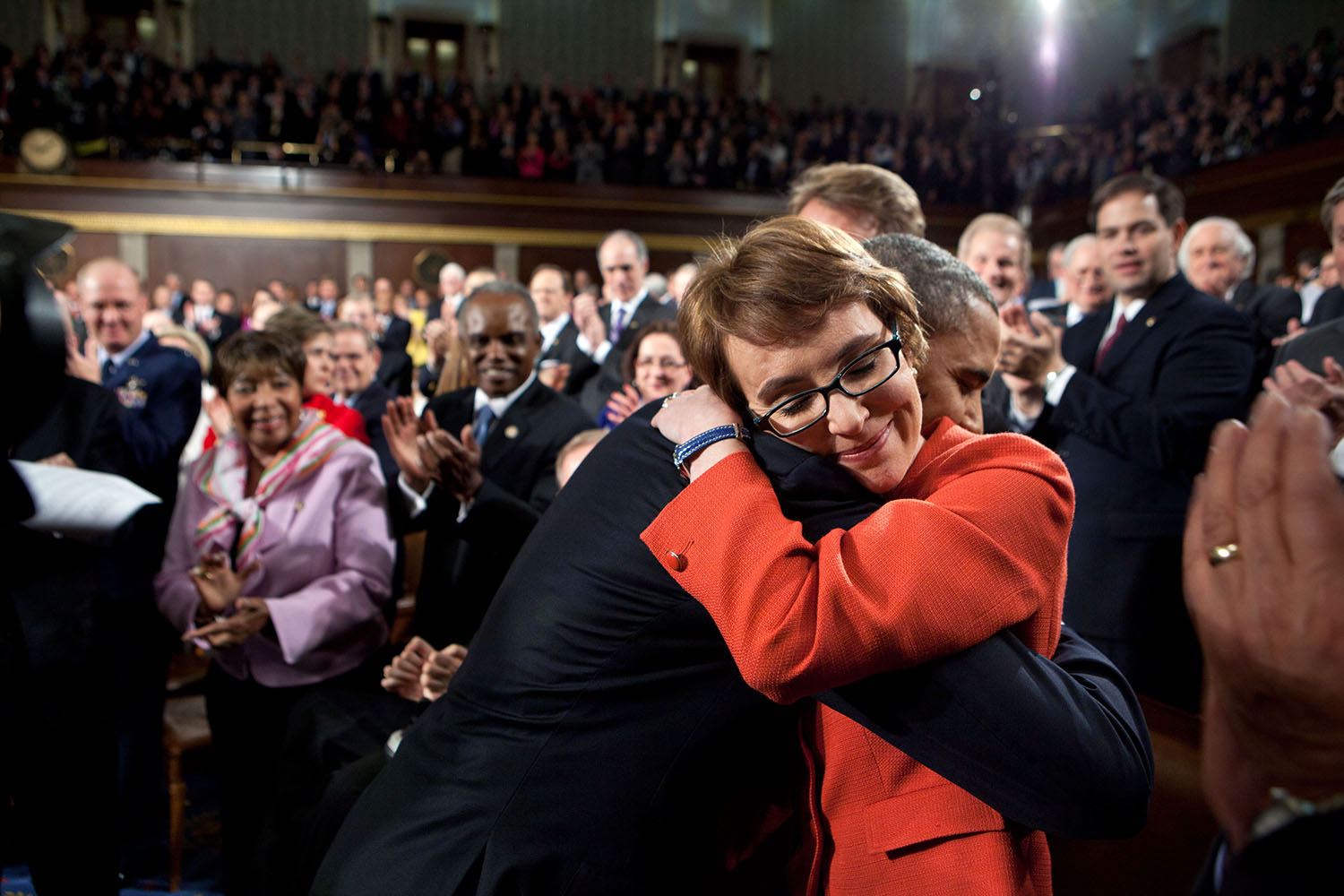 Jan. 24, 2012
"One of the most memorable moments of the year was when the President hugged Rep. Gabrielle Giffords as he walked onto the floor of the House Chamber at the U.S. Capitol to deliver his annual State of the Union address." 
(Official White House Photo by Pete Souza)

This official White House photograph is being made available only for publication by news organizations and/or for personal use printing by the subject(s) of the photograph. The photograph may not be manipulated in any way and may not be used in commercial or political materials, advertisements, emails, products, promotions that in any way suggests approval or endorsement of the President, the First Family, or the White House.