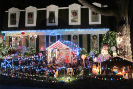 Inflatable characters, a nativity scene, an entire gingerbread village - what does't this house have? See it at 8700 Nanlee Drive in Springfield. (Courtesy Holly Zell)