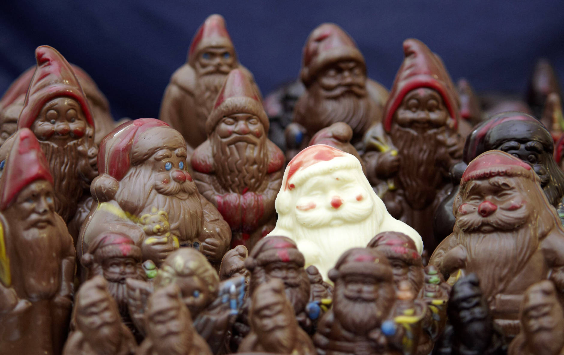 Chocolate Santa Claus are seen in a chocolate manufactory in Rostock, northern Germany, Monday, Dec. 14, 2009. (AP Photo/Thomas Haentzschel)
