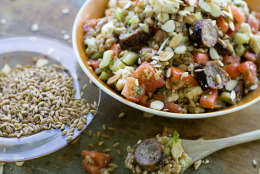 A dish of warm farro salad with grilled Italian sausage is seen in this photo taken Monday, July 11, 2011 in Concord, NH. (AP Photo/Matthew Mead)