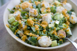 This July 15, 2013 photo shows a warm scallop salad with carrot-ginger dressing in Concord, N.H. (AP Photo/Mathew Mead)