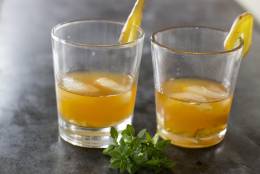 This Nov. 10, 2014 photo shows a ginger fashioned cocktail in Concord, N.H. If theres a chill in the air, consider starting with the roasted cider, a seasonal hot toddy that combines a classic mulled cider with the toasty flavor of hazelnuts. Or for a fresh take on tradition, try the ginger fashion, a zippy rendition of the reliable old fashioned. (AP Photo/Matthew Mead)