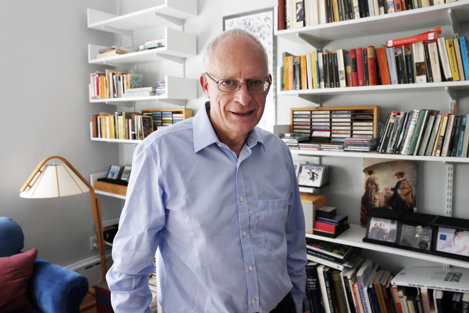 Oliver Hart, the Andrew E. Furer Professor of Economics at Harvard, poses at his home in Lexington, Mass., Monday, Oct. 10, 2016, after winning the Nobel Prize in economics. Hart and Finnish economist Bengt Holmstrom, of the Massachusetts Institute of Technology, share the award for their contributions to contract theory. (AP Photo/Michael Dwyer)